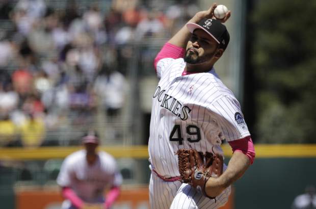 Colorado Rockies starting pitcher Antonio Senzatela throws against the San Diego Padres in the first inning of a baseball game in Denver, Sunday, May 12, 2019. (AP Photo/Joe Mahoney)