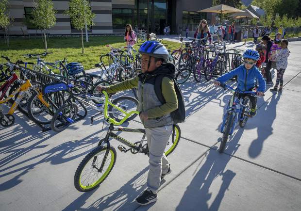 Glenwood Springs Elementary students look for a spot to store their bikes during Garfield County Schools Bike to School Day Tuesday in Glenwood. Schools from Glenwood, Carbondale, New Castle, Rifle, Silt and Parachute took paet in the event organized by Garfield Clean Energy, Garfield County Putdoors and the schools.