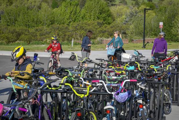 Glenwood Springs Elementary students look for a spot to store their bikes during Garfield County Schools Bike to School Day Tuesday in Glenwood. Schools from Glenwood, Carbondale, New Castle, Rifle, Silt and Parachute took paet in the event organized by Garfield Clean Energy, Garfield County Putdoors and the schools.