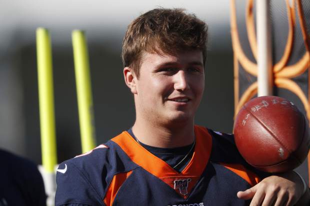 Denver Broncos quarterback Drew Lock takes part in drills during the opening day of the team's NFL football training camp Thursday, July 18, 2019, in Englewood, Colo. (AP Photo/David Zalubowski)