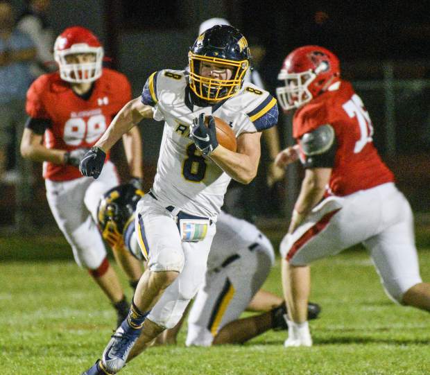 Rifle’s Levi Warfel breaks out into the open on his way to a 85 yard touchdown run late in the second quarter against Glenwood Friday. The Bear beat the Demons 34-7 for their ninth straight victory in the rivalry game.
