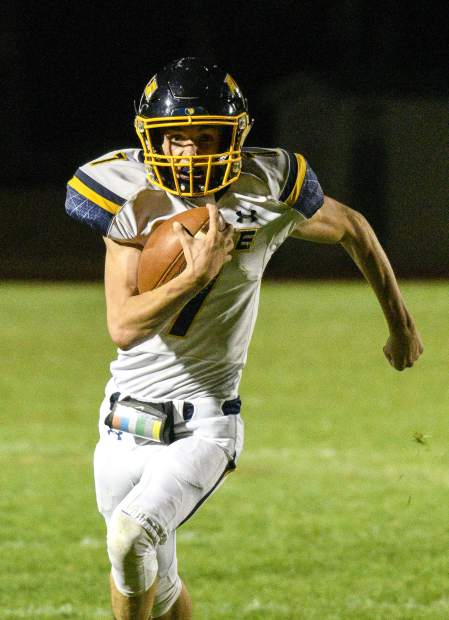 Rifle’s Holden Stutsman finds room to run during the fourth quarter against Glenwood Springs.
