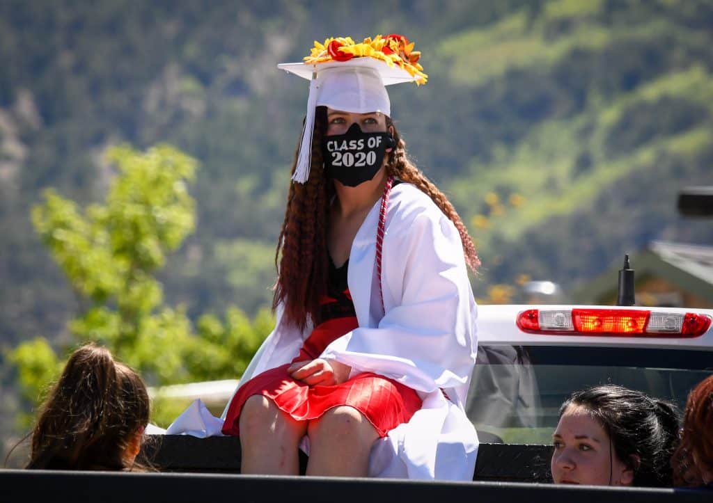A Yampah Mountain High School graduate waits in line at the drive-in graduation ceremony on Firday morning.