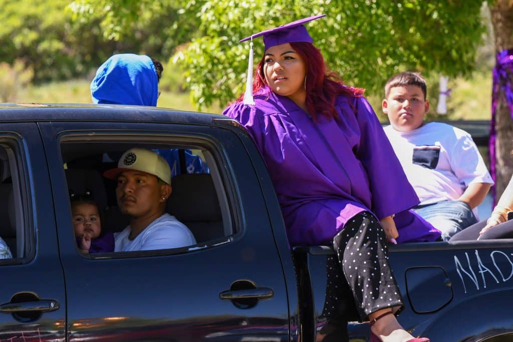 A Yampah Mountain High School graduate waits in line at the drive-in graduation ceremony on Firday morning.