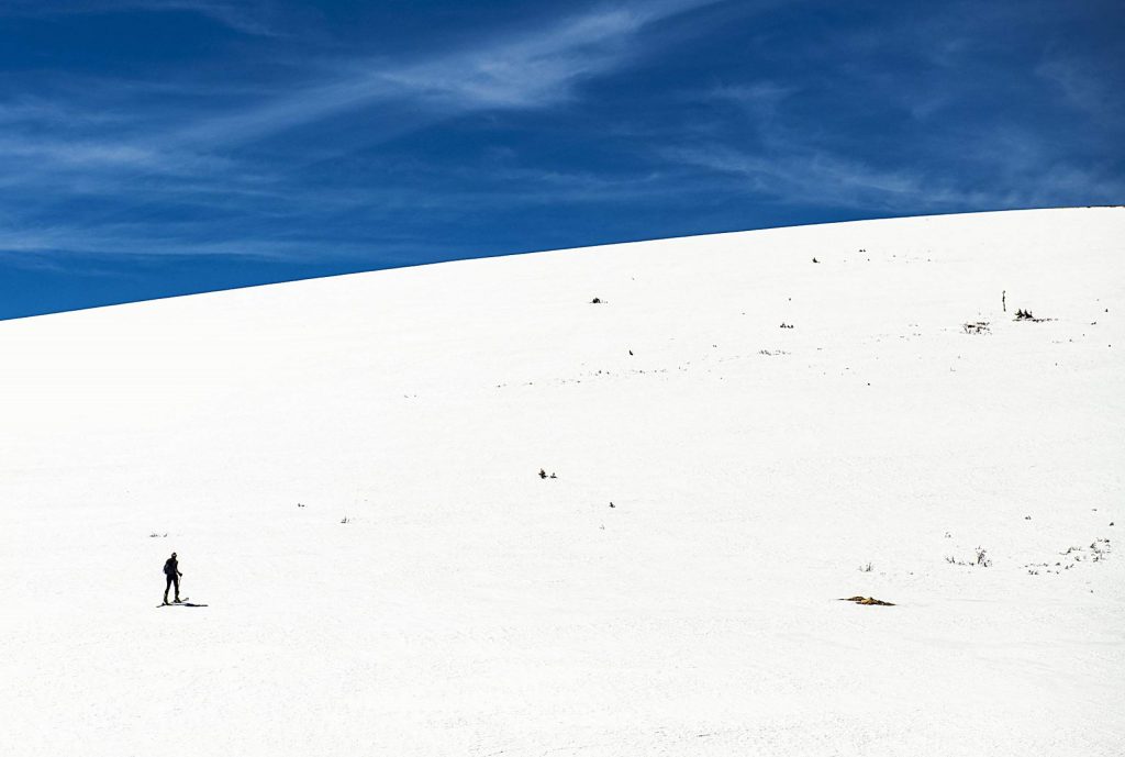 Independence Pass Foundation executive director Karin Teague skins to the weather monitoring station near the summit of Independence Pass on Tuesday, May 5, 2020. (Kelsey Brunner/The Aspen Times)