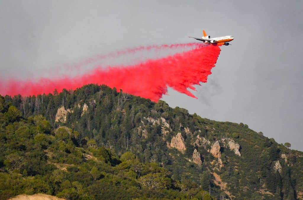 An airtanker drops fire retardant slurry on the ridge directly above No Name after the Grizzly Creek Fire broke out inside Glenwood Canyon just east of Glenwood Springs on Monday afternoon.