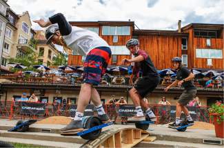 From front to back, Blake Crow, Elai Danker and Jack Mudd conquor an obsitcale course on Onewheels on June 16, 2016, in Vail.