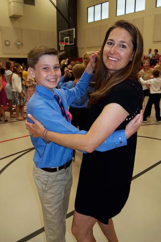 PJ and Tanya Kessenich take part in the parent-child dances during the Eagle County Charter Academy formal on May 26.