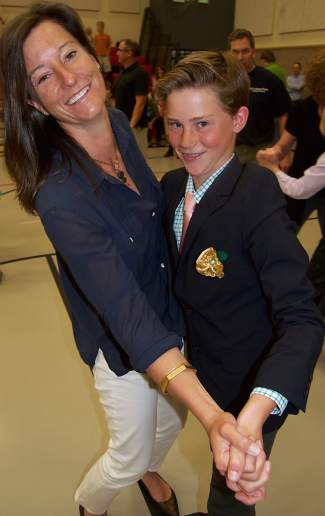 Emily Large, left, said she is proud of her sixth-grade son, Carter, for maturing and learning leadership through the Vail Performing Arts Cotillion.
