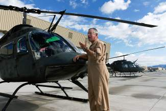 Helicopter pilot Carl Gray speaks about the two U.S. Army OH-58 helicopters that are going out on their last mission before being retired by the HAATS training facility in Gypsum. Gray has been flying in the area for more than 22 years and will be leaving with the helicopters.
