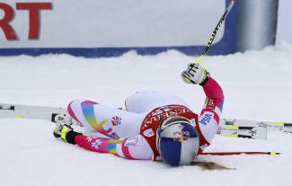 Lindsey Vonn of United States, reacts in the finish area following her run in the women's World Cup downhill ski race in Lake Louise, Alberta, Saturday, Dec. 6, 2014. (AP Photo/The Canadian Press, Jeff McIntosh)
