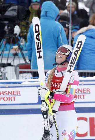 Lindsey Vonn of United States, reacts in the finish area following her run in the women's World Cup downhill ski race in Lake Louise, Alberta, Saturday, Dec. 6, 2014. (AP Photo/The Canadian Press, Jeff McIntosh)