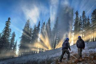 Copper Mountain fired up the snow guns early Sunday morning on the Andy's Encore trail after the wet-bulb temperature reached 27 degrees. Copper is scheduled to open in 32 days, on Nov. 6. Vail Mountain is set to open Nov. 20.