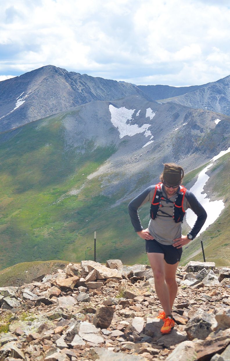 Summit Daily News managing editor at the summit of Peak Eight (12,987 feet) near the tail end of the Tenmile Traverse. While the first five peaks are relatively quick, with fast ridgeline scrambling, the final five peaks are like a marathon, with long descents on ridgeline saddles between each peak.
