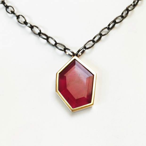 Syrah Necklace, 21.04-carat fine rubellite set in 18-karat yellow gold with black rhodium-plated sterling silver chain.
