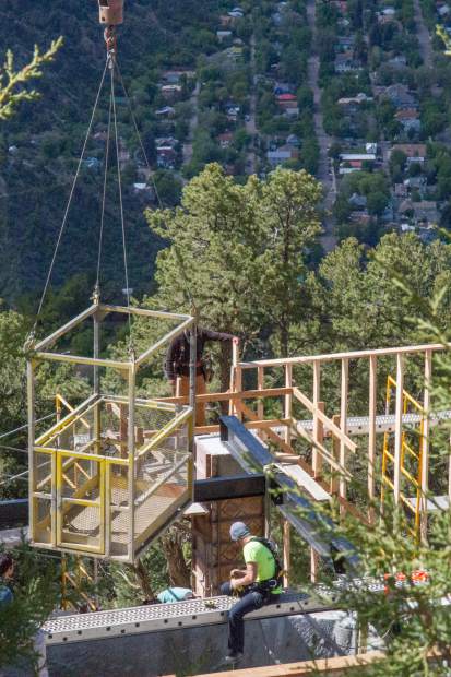 Crews continue work to install the new Haunted Mine Drop on-site at the Glenwood Adventure Park.