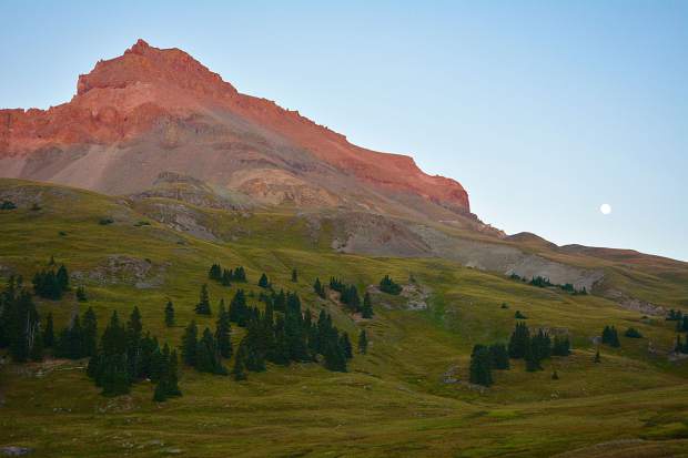 Uncompahgre Peak is Colorado's sixth highest 14,000 foot mountain. The valley floor below it made for a spectacular campsite, especially with the full moon rising overhead.