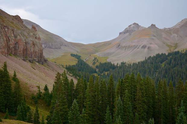 Looking from a hilltop towards the first pass in the Uncompahgre Wilderness. In this vast wilderness, there are numerous intersecting trail systems to choose from.