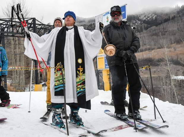 The Rev. Wendy Huber delivers a blessing and gives thanks for the recent snow before the opening of the Tercero lift at Sunlight Mountain on Thursday.