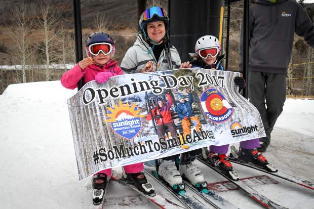 Sedona Ditlow, 7, Ashly, and Bristol Ditlow, 9, were the honorary first skiers on the lifts during the opening day at Sunlight Mountain on Thursday.