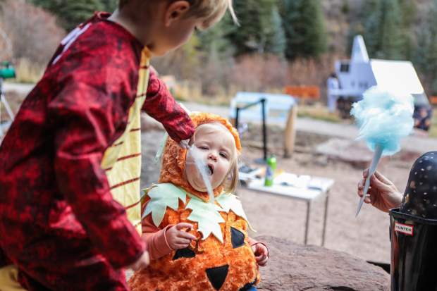 Liam Pellican, 4, feeds cotton candy to his sister, Lily, 1, at the annual Walking Mountains Science Center Fright at the Museum Saturday, Oct. 27, in Avon. This year was the 20th anniversary, 