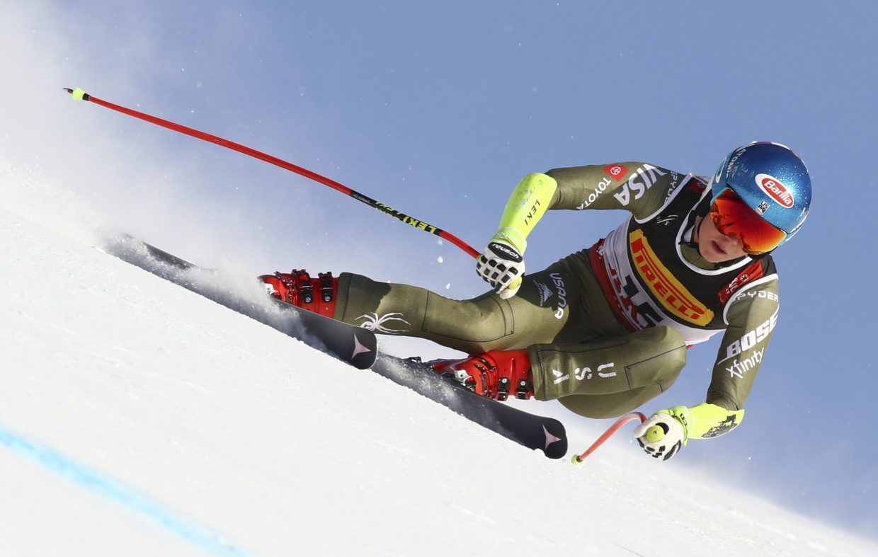 Mikaela Shiffrin races to a win in the women's super-G at worlds. She edged out Italy's Sofia Goggia by 2-hundredths of a second.