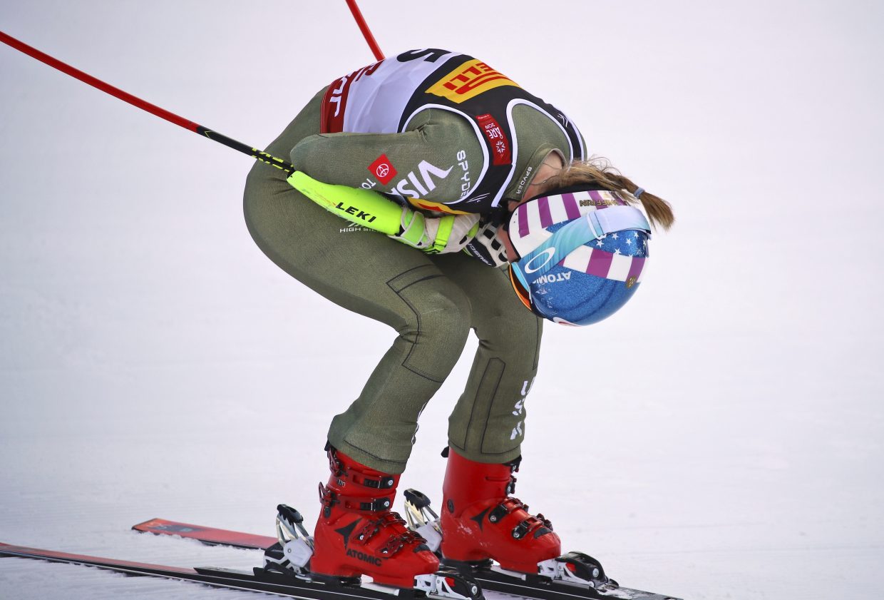 United States' Mikaela Shiffrin has one of her quiet moments after winning the worlds super-G on Tuesday in Are, Sweden. Shiffrin often has a delayed reaction, she says, because she is committing the just-finished race to memory.