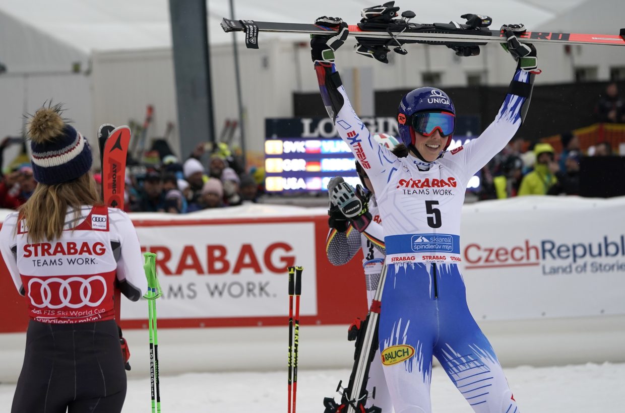 Slovakia's Petra Vlhova, right, celebrates while Mikaela Shiffrin looks on after winning Friday's World Cup giant slalom, in Spindleruv Mlyn, Czech Republic. While Shiffrin has ruled the women's World Cup this season, Vlhova has been a fierce competitor.