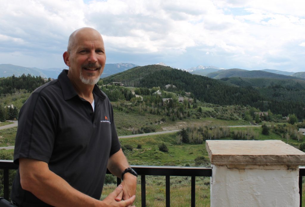 Jeff Brooks, Chief Operating Officer for All Points North Lodge takes in the expansive view from a deck at the Cordillera facility. The integrated behavioral health, wellness and addiction recovery program plans to open its residential treatment program this winter.