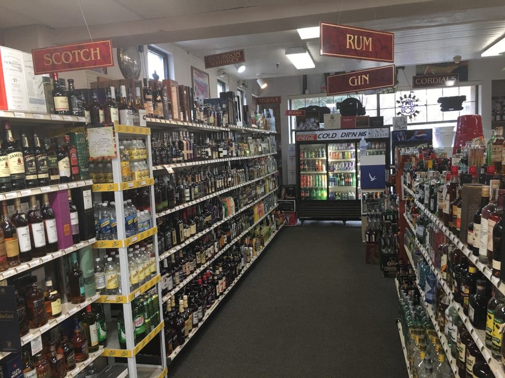 Liquor stores have been open during the COVID-19 pandemic, but Avon Liquor encourages customers to take advantage of the curbside pickup and delivery options. 
