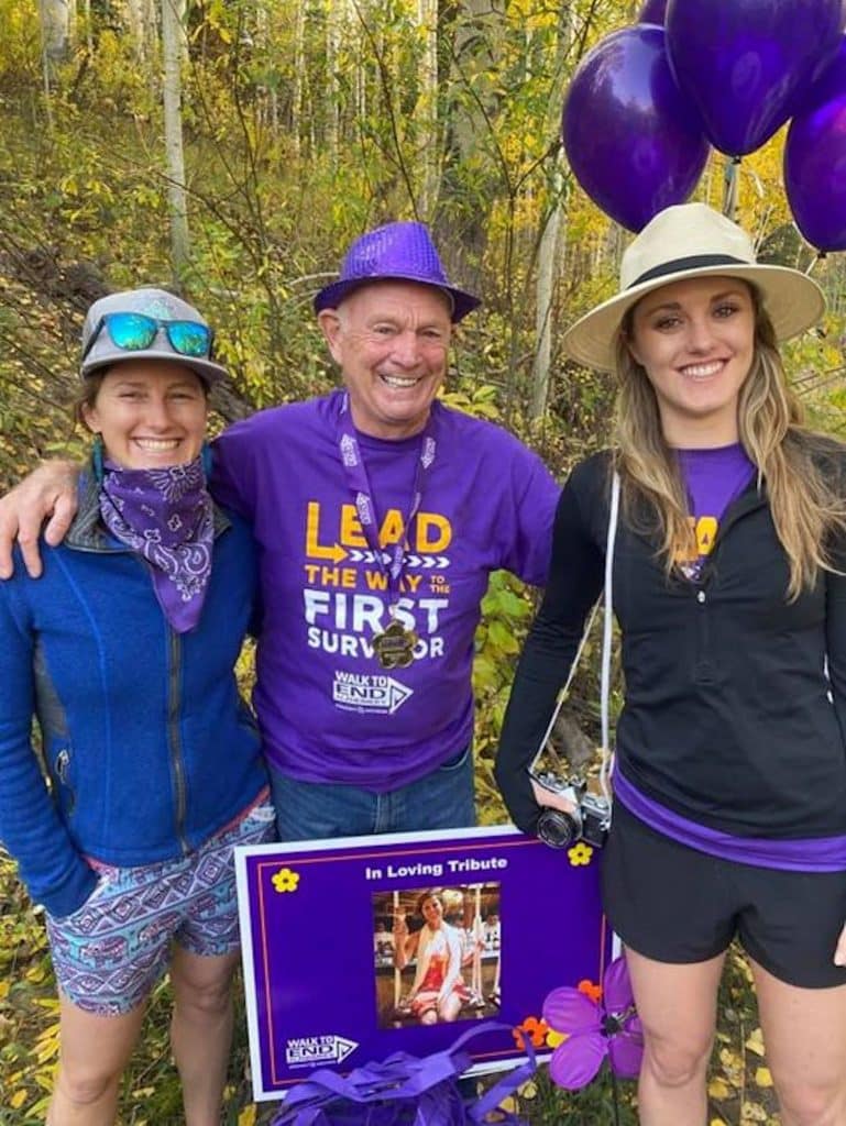 Team Lucy members Ron Davis, center, and daughters Ashley and Polly walk for wife and mother, Lucy Davis on the West Lake Creek Trail in Edwards during Saturday’s Walk to End Alzheimer’s. 