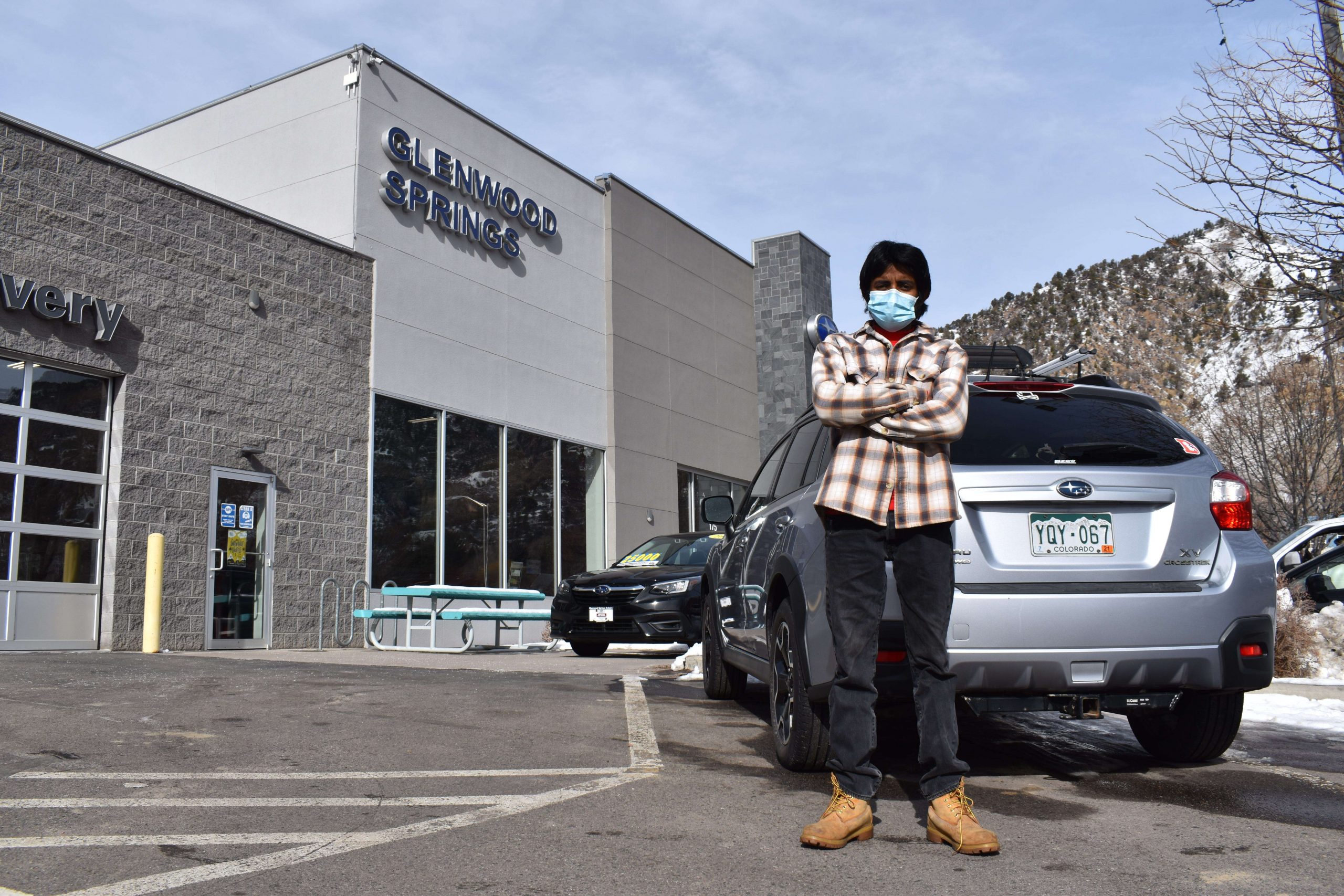 Glenwood Springs auto dealership worker saves woman from potential