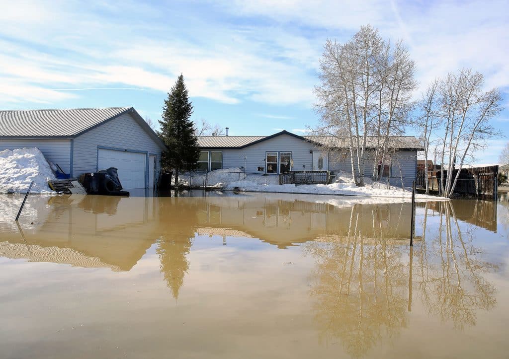 PHOTOS Flooding causes closures in Hayden