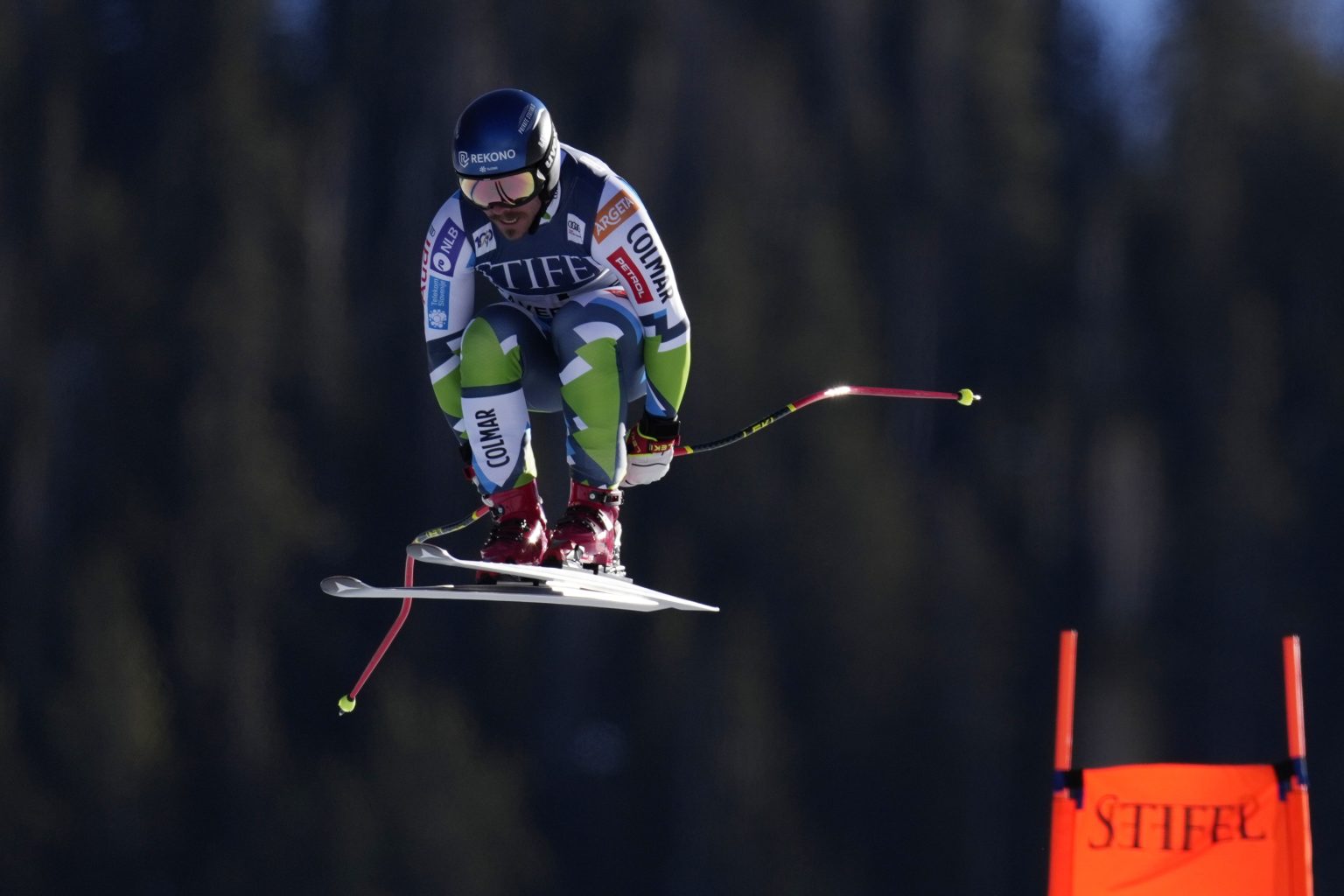 Swiss skiers take top two steps of downhill podium on first day of ...