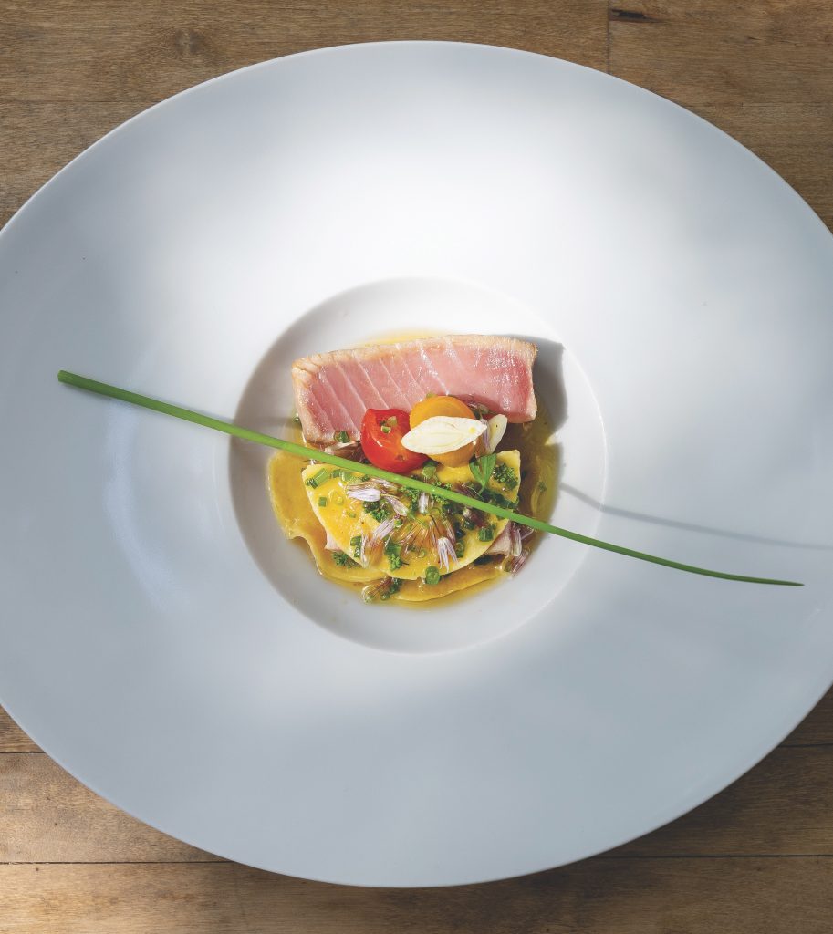 Tuna and artichoke ravioli with seared rare yellowfin tuna and artichoke cream.