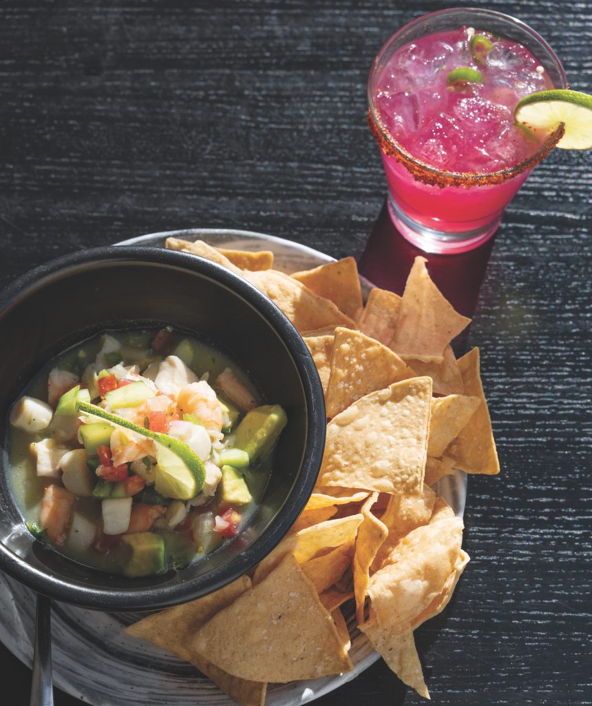 Ceviche with Mexican bay scallops, white shrimp, mahi-mahi and veggies with lime juice, served with tortilla chips.