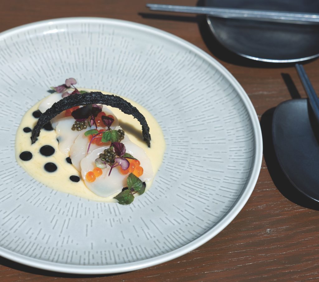 Japanese scallops with beurre blanc, squid ink dashi and caviar.