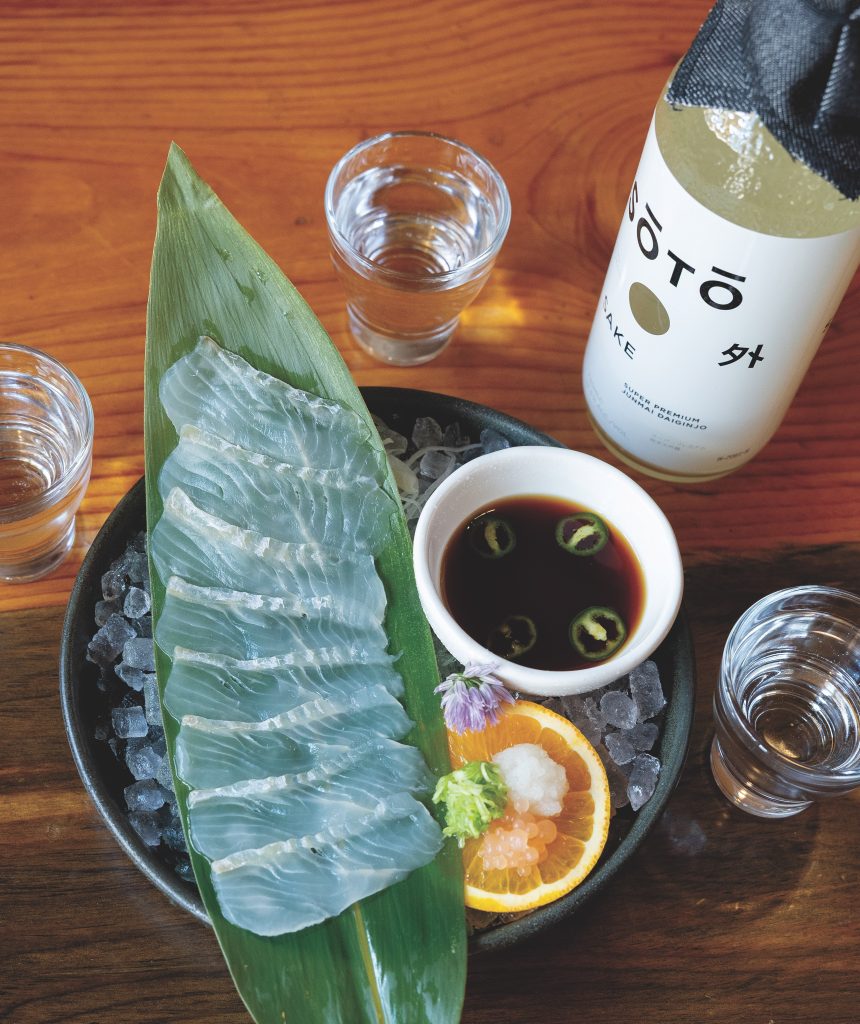 Five days dry-aged hirame (Japanese olive flounder) usuzukuri with ponzu and grapefruit pearls.