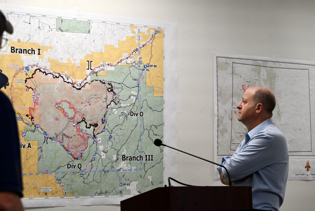 Colorado’s Jared Polis visits the Western Slope as wildfires rage