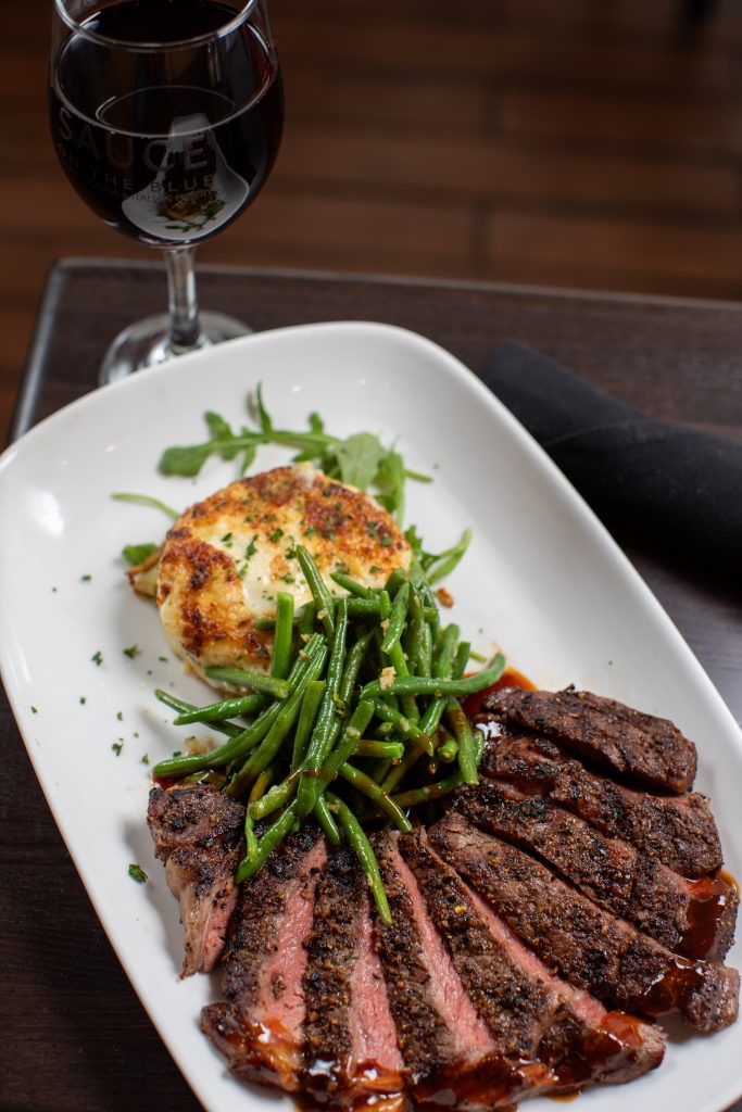 Certified Angus prime rib, house-made blue cheese gratins and sauteed green beans.