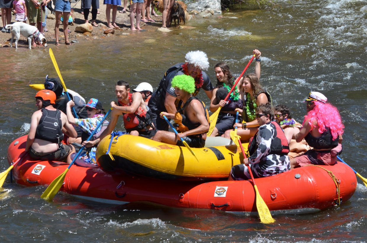 A team of rafters takes an unconventional approach to hedging its odds for surviving Charlie's Hole on the Yampa River.