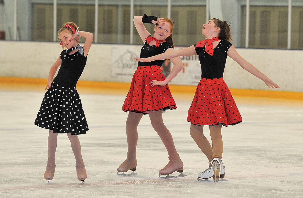 Steamboat Springs Figure Skating Club members, from left, Alison Famulare, Mariah Walker and Sage Turek wrap up their performance of “You Can’t Stop the Beat” during a rehearsal for the “Broadway on Ice” spring ice show. The show will take place at 7 p.m. today and Saturday at Howelsen Ice Arena.