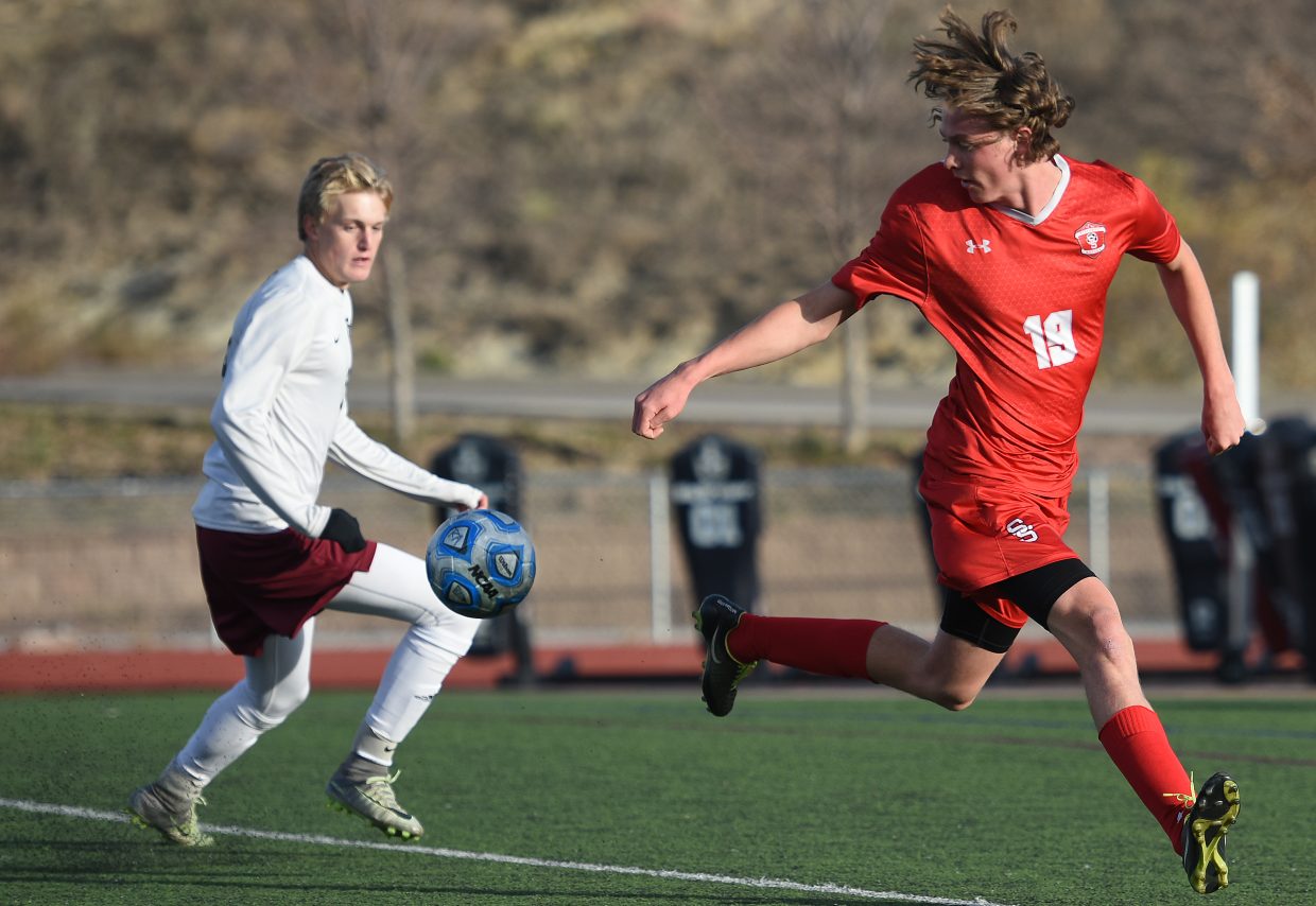 Steamboat’s Will Beurskens tries to get in front of the ball Tuesday against The Classical Academy.