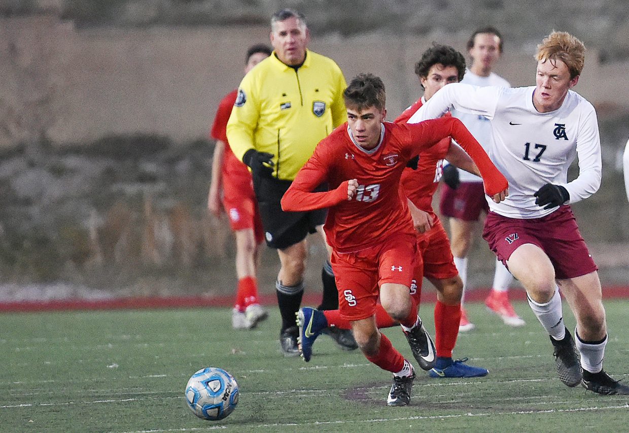 Stemaboat’s Muprhy Bohlmann looks to push the ball up the field on Tuesday playing against The Classical Academy in the second round of the Class 4A state soccer tournament.