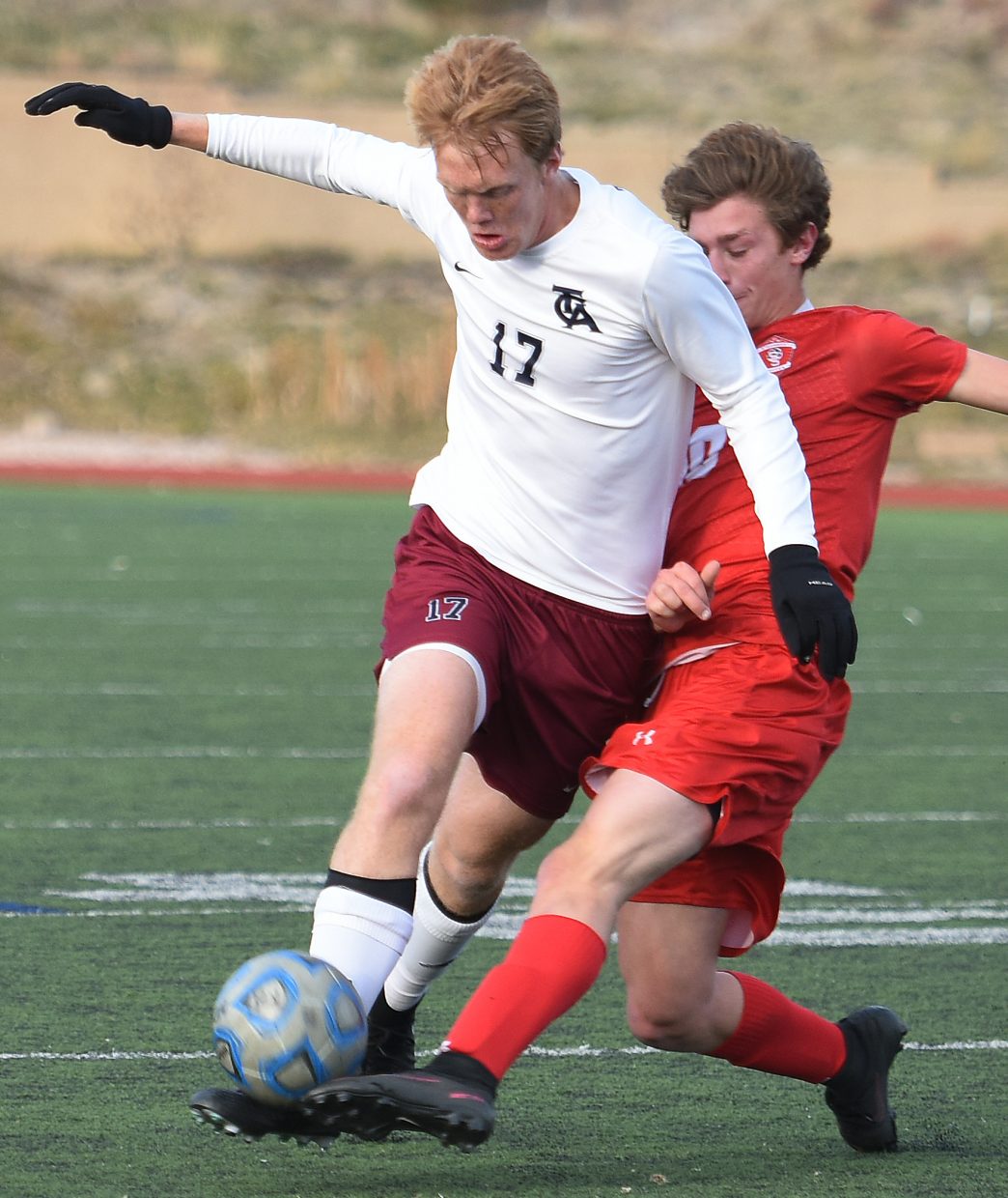 Steamboat’s Quinn Connell gets physical with The Classical Academy’s Jonny Stephens on Tuesday in the second round of the Class 4A state playoffs.