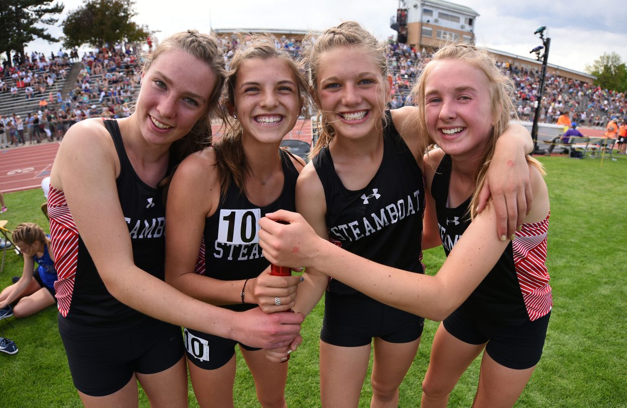 Winter Boese, left, Maggi Congdon, Isabelle Boniface and Marcada Baker pose after placing third at the state track meet in the 3,200-meter relay. They also set the school record in the process, by a whooping 17 seconds.