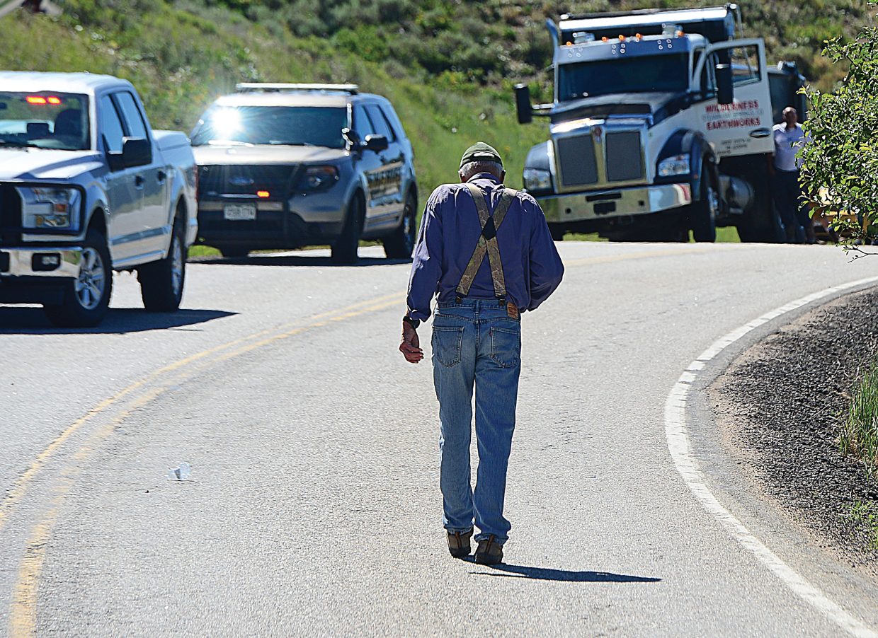 Arie Hoogendoorn makes his way back home after a fire destroyed the historic barn on his property Monday just off Routt County Road 129. Hoogendoorn and his wife, Sharon, own the ranch and lease it to Matt and Christy Belton, who run cattle on the property.