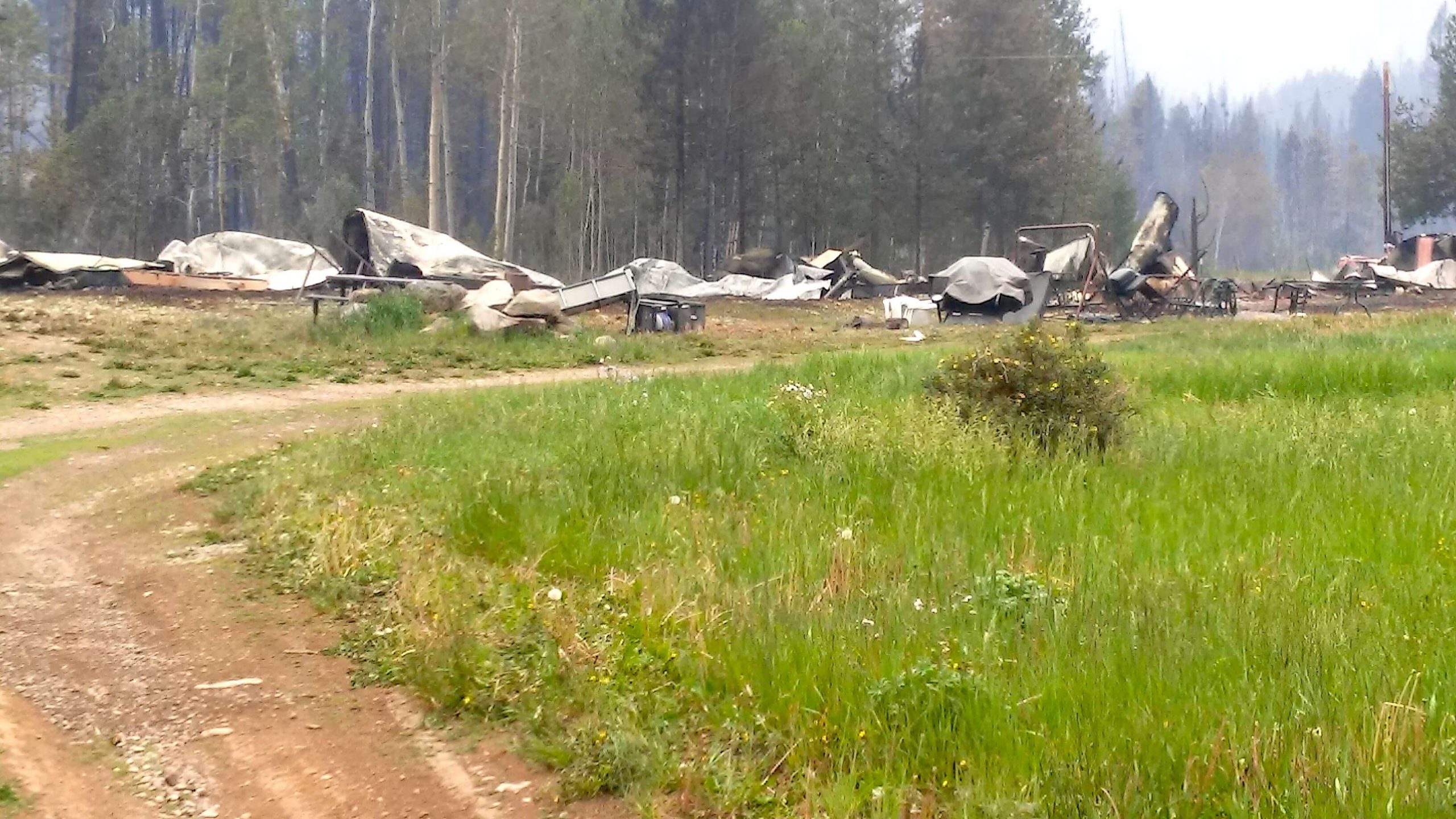 Muddy Slide Fire claims trailers, cabin on Lynx Pass Ranch; now at