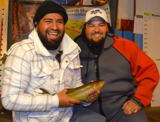 Robert Alvarado (left) and Jeff Rogakis were filled with joy and excitement as they submitted Alvarado’s winning mackinaw to the judges Sunday morning. Alvarado was in first place in the mackinaw division most of Sunday but dropped to second place shortly before the close of the tournament.