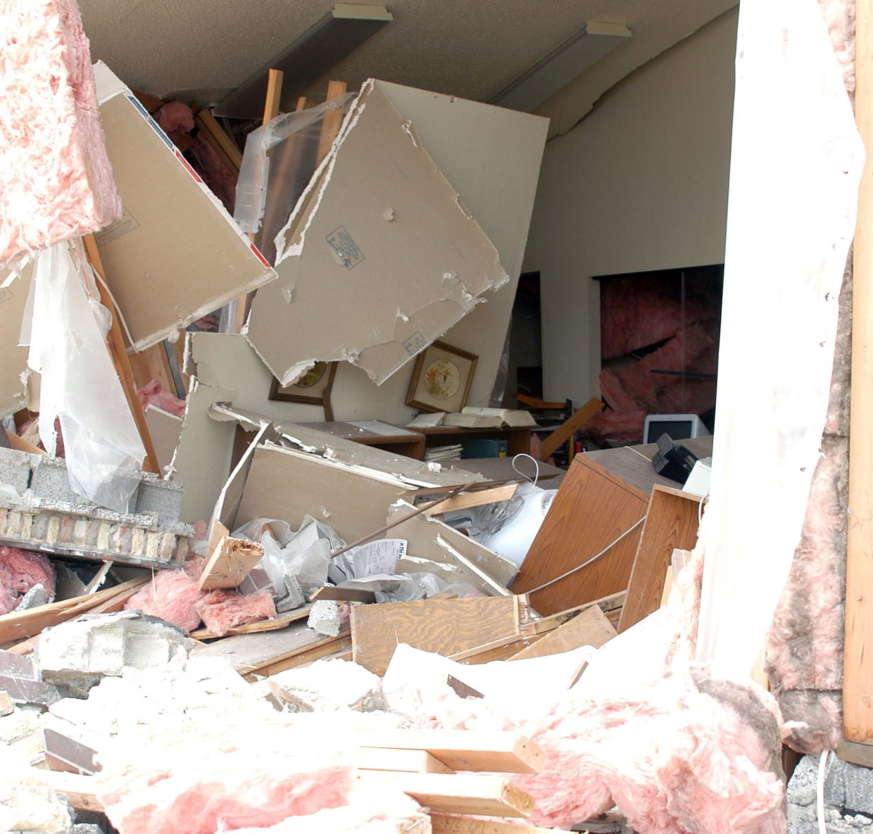 An inside view of the destroyed Sky-Hi News building after the bulldozer attack.